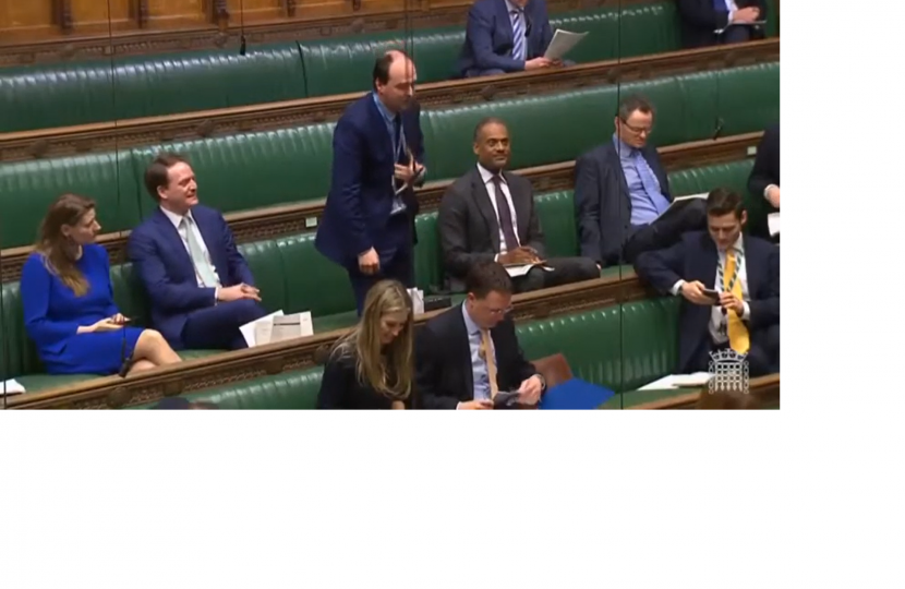 Richard Holden asks about bus services in Parliament