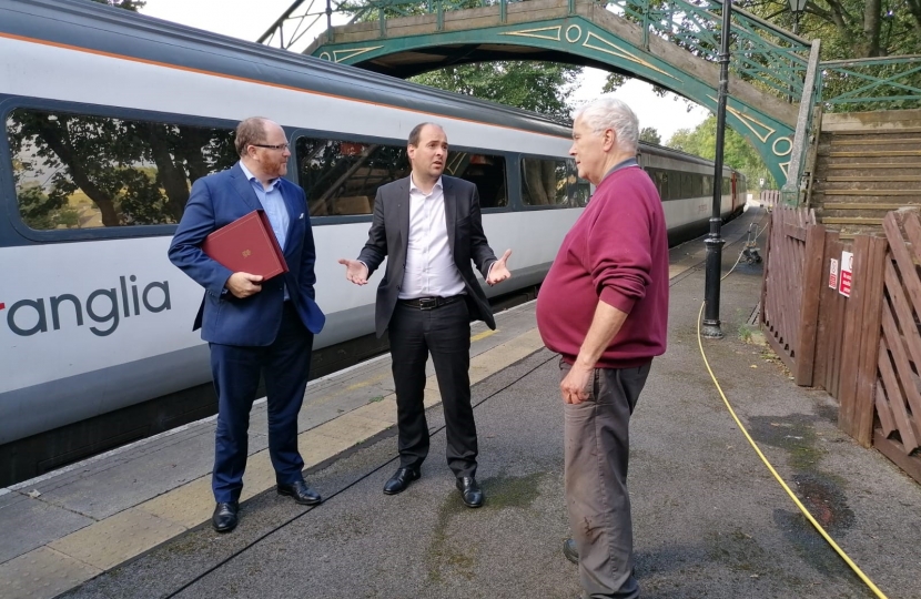Richard Holden with the Minister at the Station